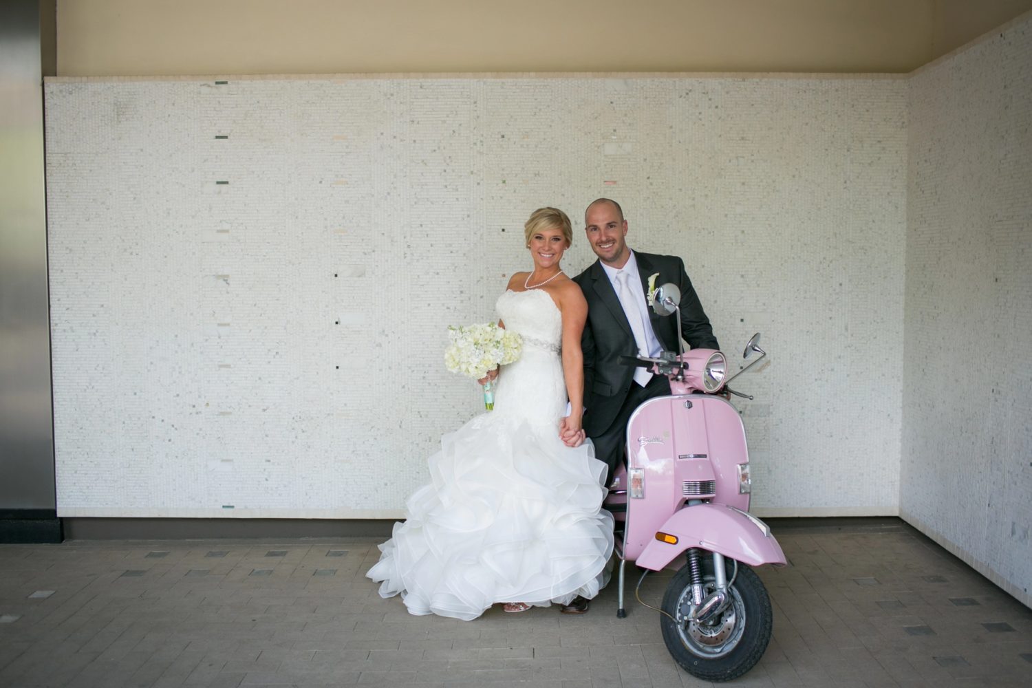 bridal portrait on pink vespa