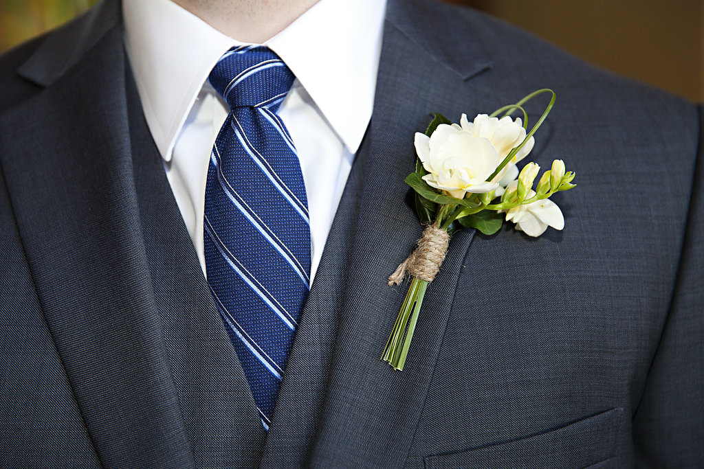 white and green groom boutinnerie Sidelines Floral